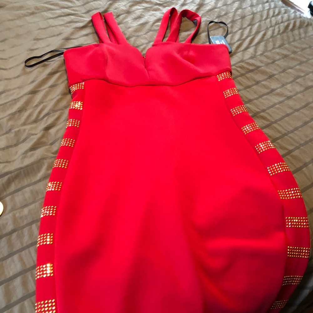 Guess red with gold accents